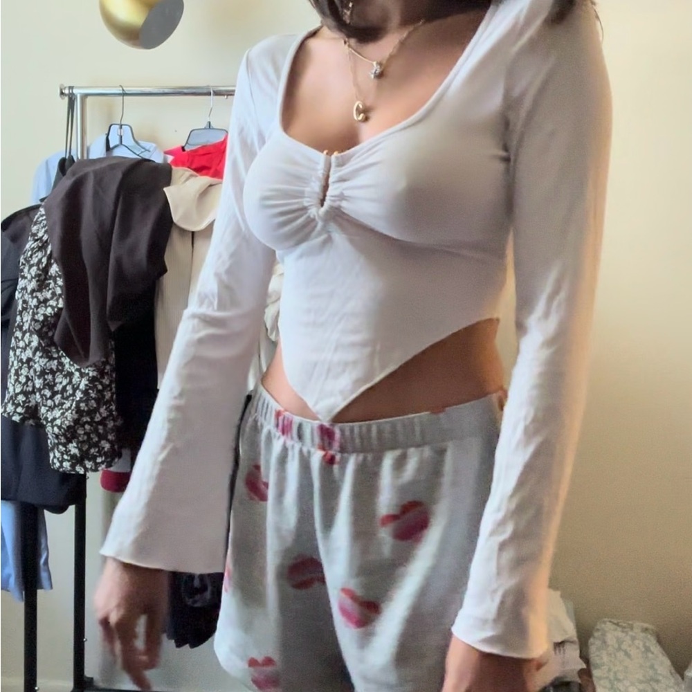 Small white long sleeve shirt